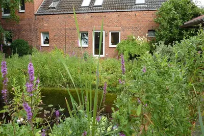 Image de Appartement confortable avec jardin de rĂŞve