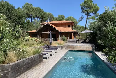 Image de Cap Ferret - Petit Piquey - Maison bois avec piscine entre ocean et bassin