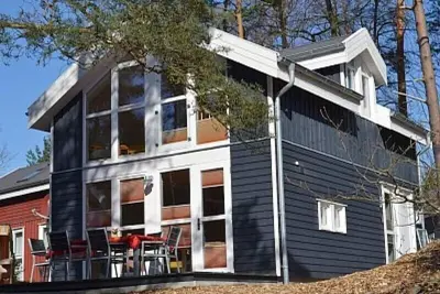 Image de 'Feel-good Beach House' avec sauna, bain à remous, chauffage au sol et cheminée