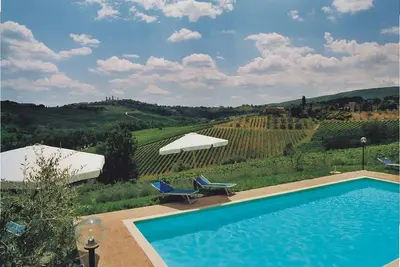 Image de Cheminée, appartement avec véranda et vue sur San Gimignano