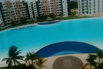 Image de Departamento con laguna cristalina de 2 hectares.