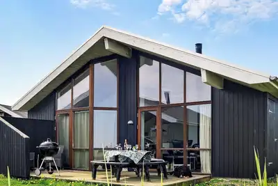 Image de Maison de vacances pour 8 a Ulfborg-By Traum