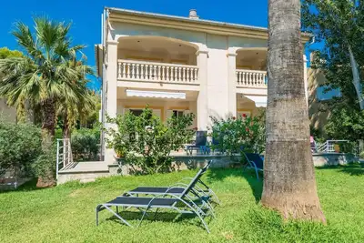 Appartement 2-1 avec sortie directe sur la plage d'Alcudia.