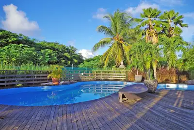 Bungalow unique au sein d'une charmante propriété
