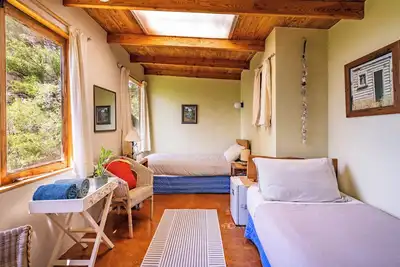 Image de Pi Honi Cabin - Ao Marama Retreat - Superbe cadre Bush et vue sur l'océan
