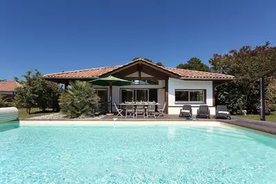 Image de Piscine privée | Villa de luxe près de la plage et du club de golf