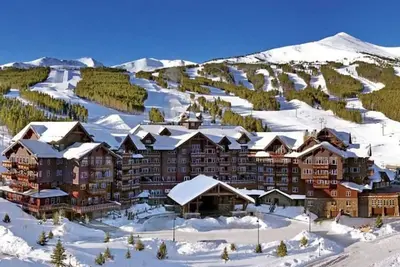 Image de Unité Premier, terrasse privée, bain à remous, piscine, spa, restaurant, bowling, en montagne