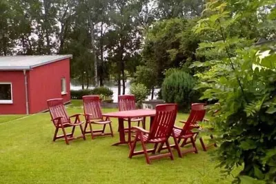 Image de Cottage directement sur le lac avec bateau Ă 6 pers. , Nombreux champignons, zone de pĂŞche, baignade