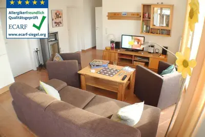 Image de Appartement près de la plage avec planchers chauffants et cheminée