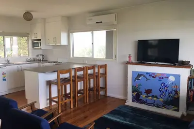 Image de Cabine côté plage - soigné et bien rangé avec vue imprenable sur la baie