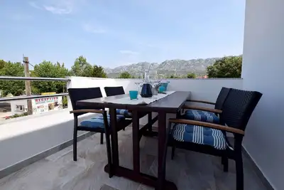 Image de Appartement de vacances avec climatisation et balcon