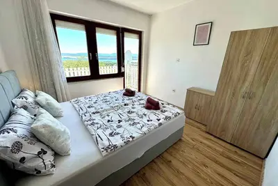 Image de Appartement de vacances avec balcon et vue sur la mer