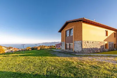 Image de Maison face à la mer pour 6 avec jardin et barbecue, idéale pour les familles