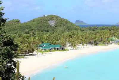 Image de Luxe Tropical Beachfront, maison entièrement équipée avec une vue imprenable et des équipements