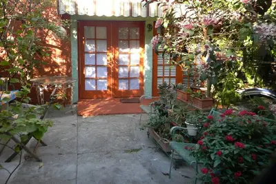 Image de Charmante maison de jardin à proximité du centre-ville, du district sanitaire et de Wynwood