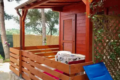 Image de Baita 1 studio dans la résidence Villa Carla 2 lits, salle de bain, véranda.