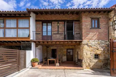 Image de Magnifica près de la maison de plage pour 10 personnes avec 4 salles de bains et jardin