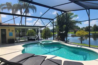 Image de Dream Weaver Villa ™ - Au bord du lac - Disney - Exposition sud avec piscine et spa à 86 ° F