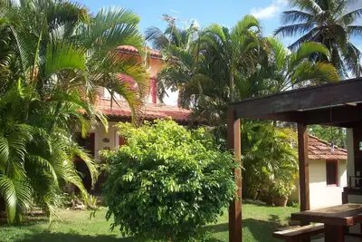 Image de Maison de plage à Itacimirim avec 4 chambres climatisées, piscine, à 300 m de la plage