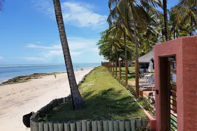 Accueil sur Coral Beach Appartement (pied dans le sable).