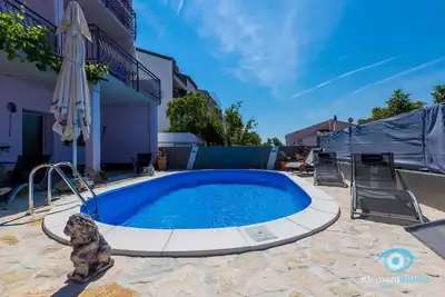 Image de Appartement de vacances avec accès à la piscine et vue sur la mer