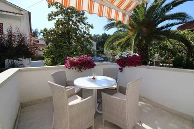 Image de Appartement de vacances avec jardin et barbecue