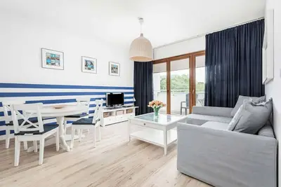Image de Appartement Chełmońskiego 4c \/ 10 avec 1 chambre à coucher
