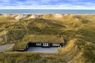 Image de Maison de vacances discrète avec vue sur la mer dans un endroit magnifique pour une dune pour 4 personnes