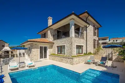 Image de Villa Lurda avec une magnifique vue mer et piscine chauffée