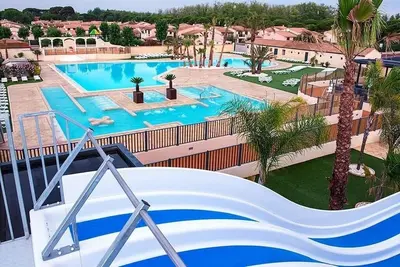 Image de maison avec piscines chauffée\/parc aquatique\/400m mer& commerces