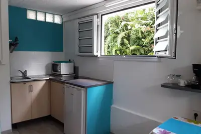 Joli studio avec terrasse situé au centre de l'île | Quartier résidentiel