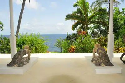 Image de Villa isolée en pierre de Corral avec jardins botaniques et accès à la plage