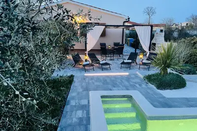 Image de Maison de vacances Tesser avec piscine