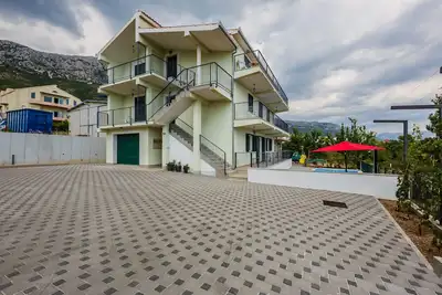 Image de Bel appartement avec vue panoramique sur la mer et piscine