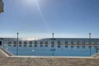 Image de Ke arriver n'importe quel jour, piscine sur la plage, cuisine complète, W \/ D, parking, quais, balcon,