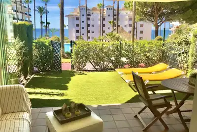Image de 1ère ligne de plage - Jardin privé + grande terrasse. Bien équipé Confortable