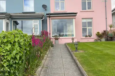 Image de Dolly's Cottage sur la baie