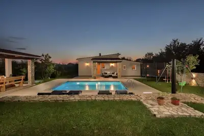 Image de Harriet - Maison de vacances familiale avec piscine, aire de jeux, intimité Top dans un quartier calme