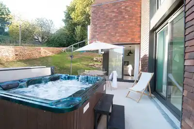 Image de Villa Côté Ouest avec Jacuzzi Privatif, terrasse et balcon