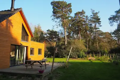 Image de Agréable maison en bois à 2 minutes de la mer au milieu d'une forêt de pins