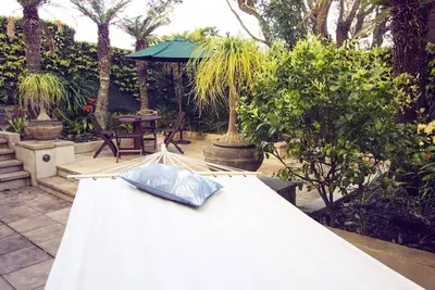 Image de Un petit coin de paradis ~ suite privée dans un jardin isolé, Wifi, etc.