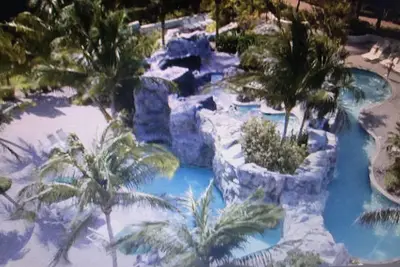 Marches spectaculaires d'une villa d'une chambre face à l'océan à la plage immaculée d'Aruba