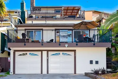 Image de Condo lumineux et familial avec grande terrasse et barbecue - Ă pied de la plage!