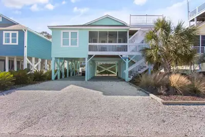 Image de Sunset Beach Cottage à quelques pas de l'océan