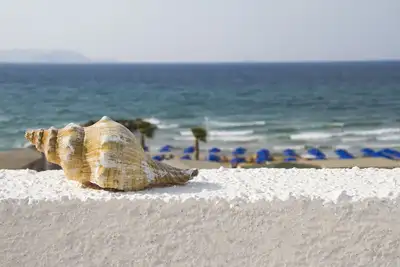 Image de Maison Blanche Kostas | par la mer