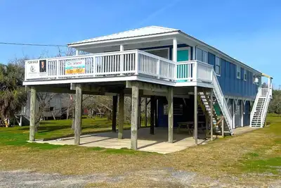 Image de Sur Island Time est en face de la plage de Grand Isle et dort 10