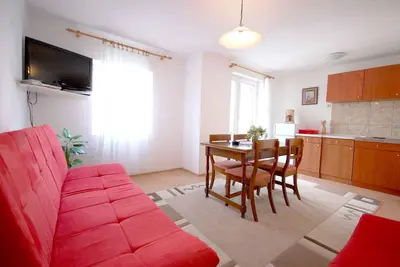 Image de Appartement de vacances avec de l'air conditionné et un accès Internet