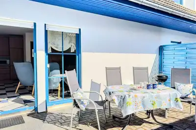 Image de Ostseeschwimmer (à droite) maison de vacances - Ferienhäuser Blaue Wieck