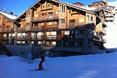 Image de Bel appartement tout confort aux pieds des pistes dans résidence type chalet