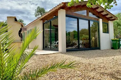 Image de Maison 6-8 pers a 300 m de la plage grand terrain clos et boisé sans vis a vis